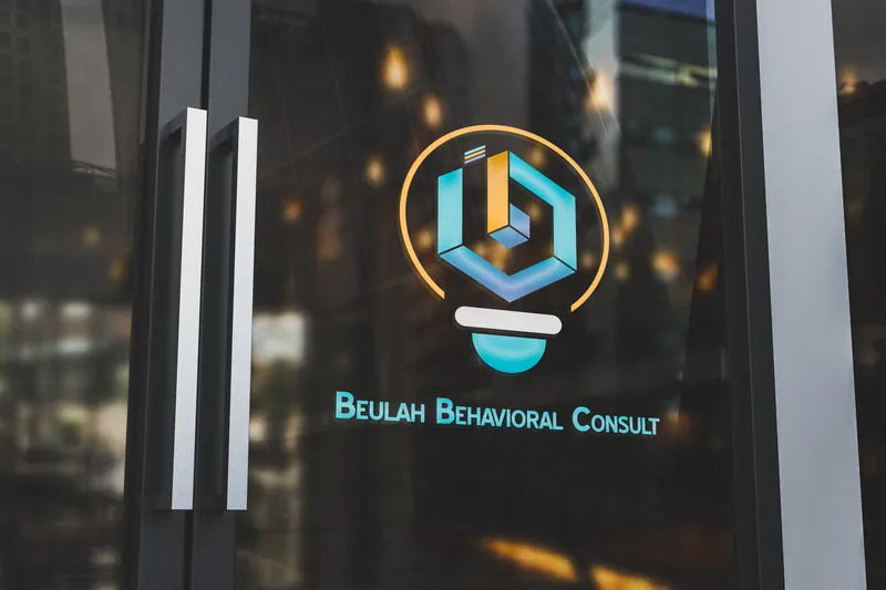 A mockup of the logo on a glass door