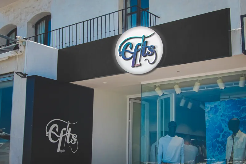 A mockup of the E-Fits Apparel logo on a shopfront